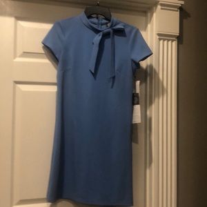 vince camuto blue dress with bow at neckline.